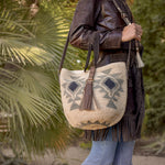 Agave straw handwoven bag with leather straps.