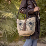 Agave straw handwoven bag with leather straps.