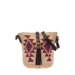 Agave straw handwoven bag with leather straps.
