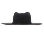 Ninakuru long brim wool hat with leather band and bronze eyelet.