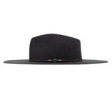 Ninakuru long brim wool hat with leather band and bronze eyelet.