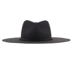 Ninakuru long brim wool hat with leather band and bronze eyelet.