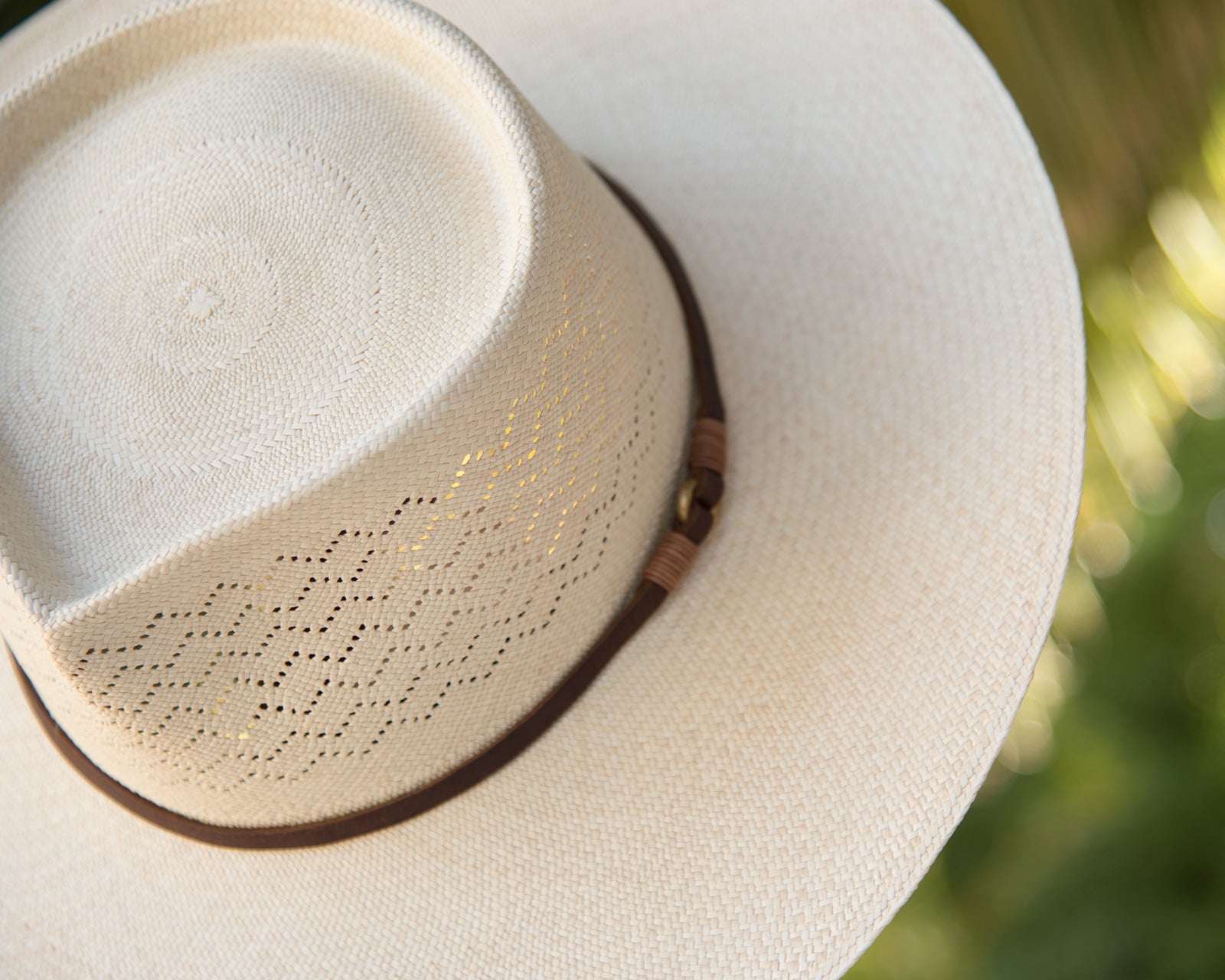 Ninakuru Panama hat with leather band and stampede strap.