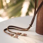 Ninakuru Panama hat with leather band and stampede strap.