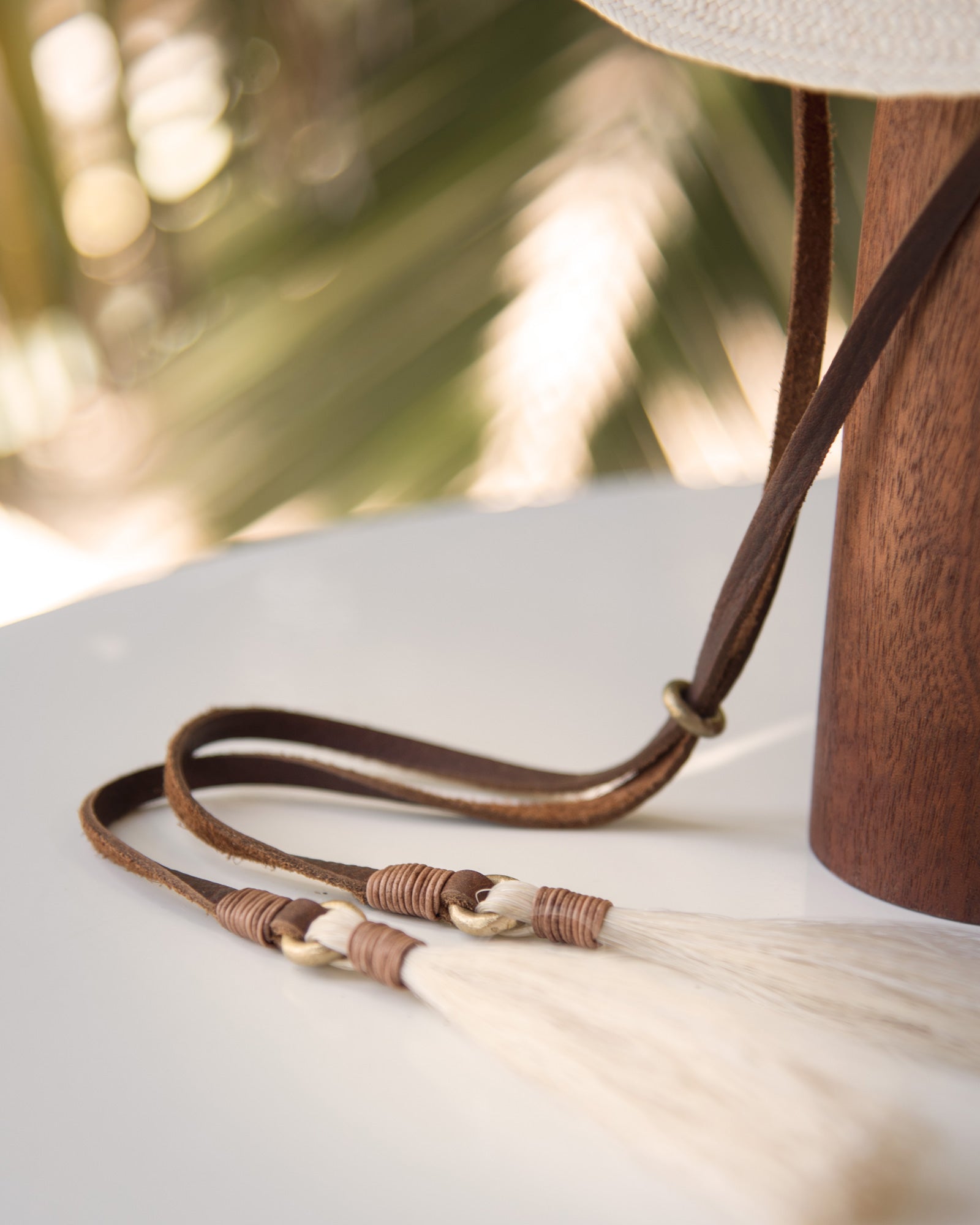 Ninakuru Panama hat with leather band and stampede strap.