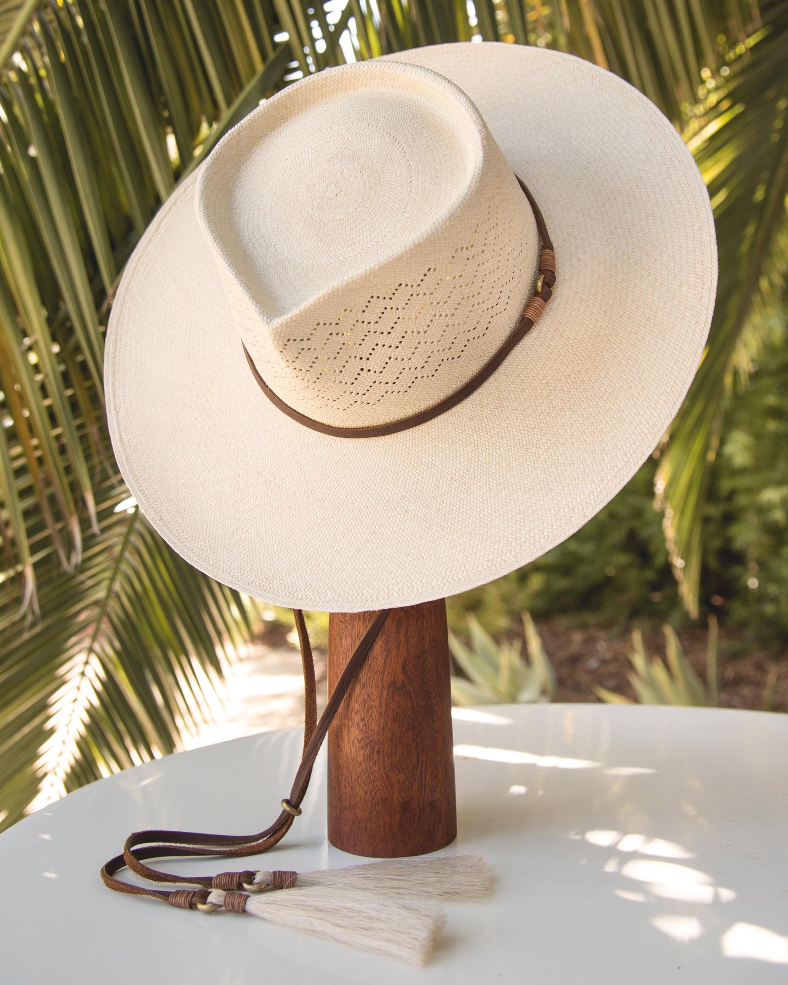 Ninakuru Panama hat with leather band and stampede strap.