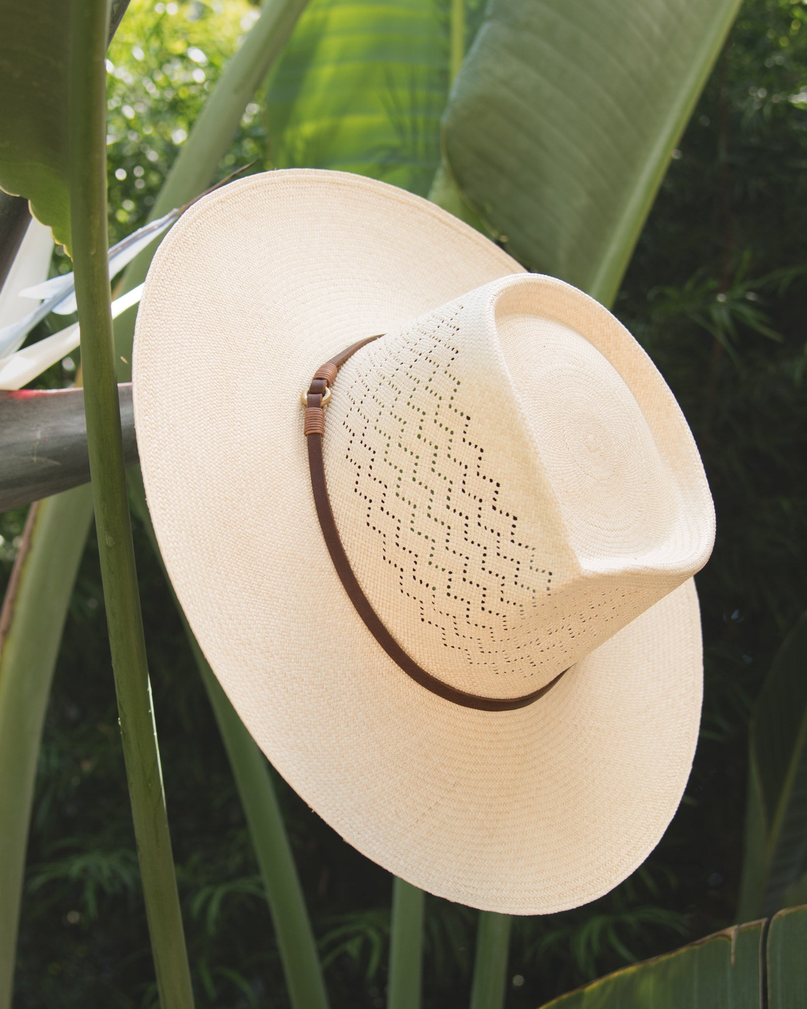 Ninakuru Panama hat with leather band and stampede strap.