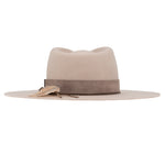 Ninakuru wool hat with leather band, feather and bronze.