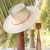 Ninakuru Panama hat with leather braided band and stampede strap.