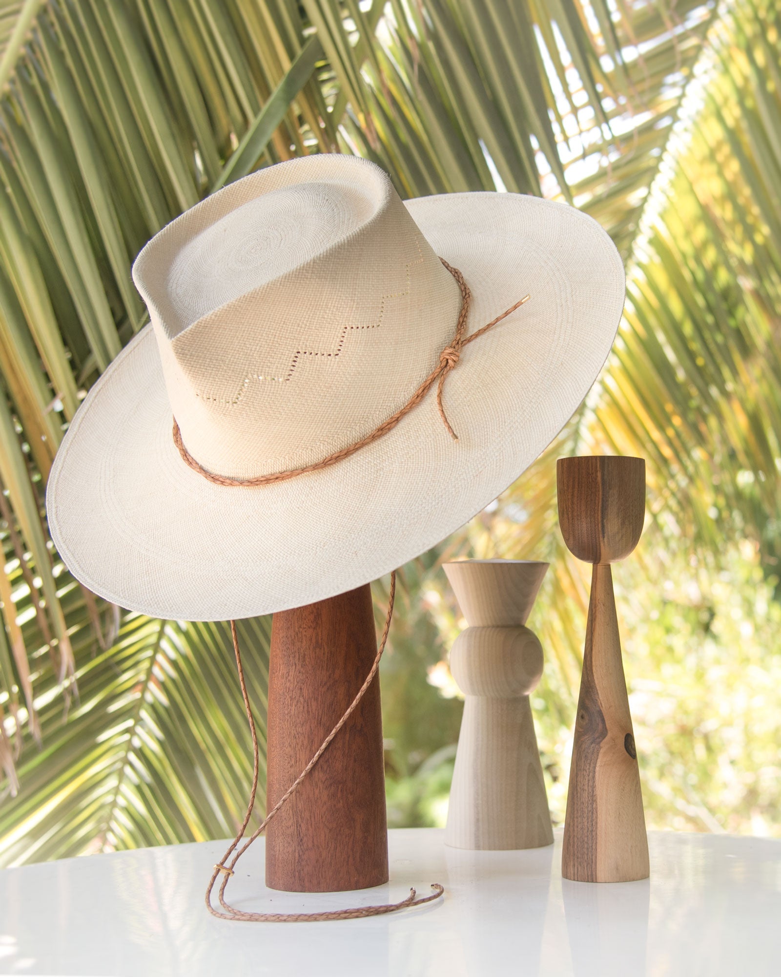 Ninakuru Panama hat with leather braided band and stampede strap.