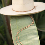 Ninakuru Panama hat with leather braided band and stampede strap.
