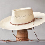 Ninakuru Panama hat with leather braided band and stampede strap.