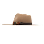 Ninakuru wool hat with vegan band and brass loops.