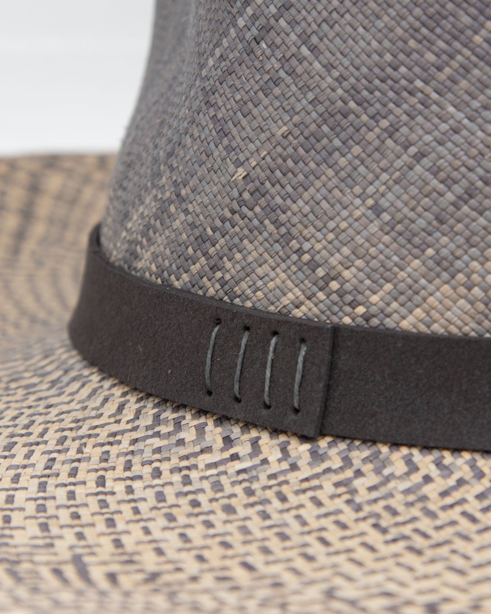 Ninakuru Panama hat with teardrop crown and suede band.