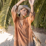 Ninakuru Panama hat with teardrop crown and suede band.