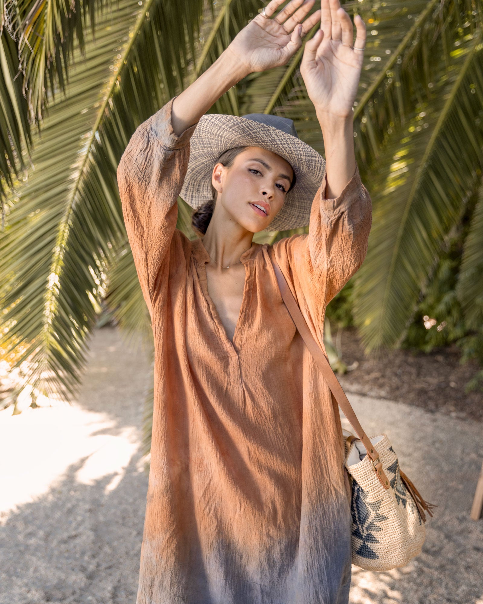 Ninakuru Panama hat with teardrop crown and suede band.