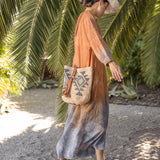 Ninakuru Panama hat with teardrop crown and suede band.
