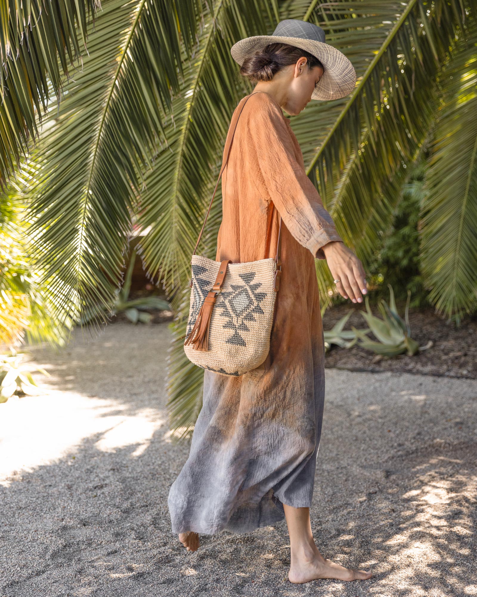 Ninakuru Panama hat with teardrop crown and suede band.