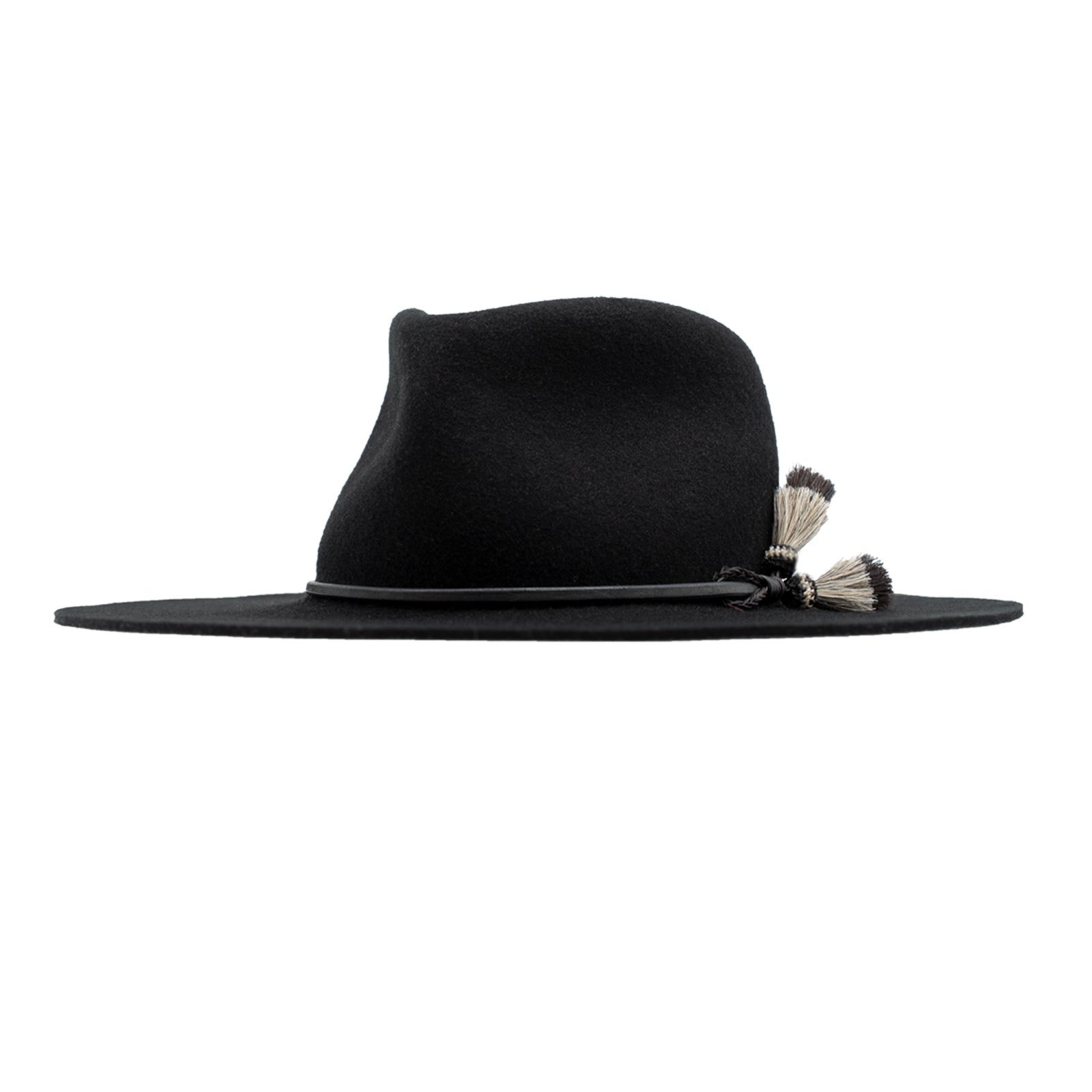 Ninakuru long brim wool hat with leather band and horsehair tassels.