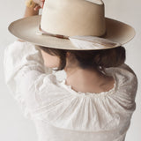 Ninakuru Panama hat with leather band and game feather.