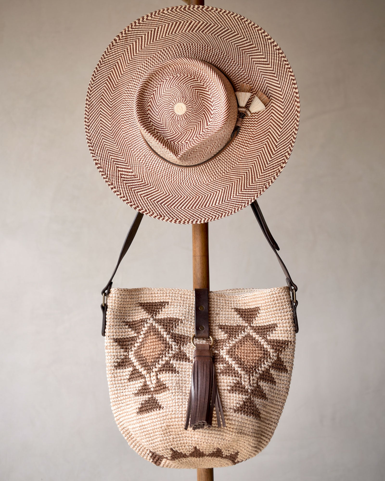 Ninakuru Panama hat with leather and horsehair, paired with agave straw bag.