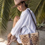 Ninakuru Panama hat with leather and horsehair, paired with agave straw bag.