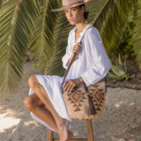 Ninakuru Panama hat with leather and horsehair, paired with agave straw bag.