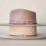 Ninakuru wool felt hat with leather, velvet and rose.