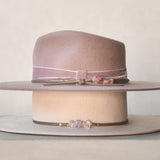 Ninakuru wool felt hat with leather, velvet and rose.
