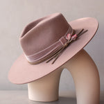 Ninakuru wool felt hat with leather, velvet and rose.