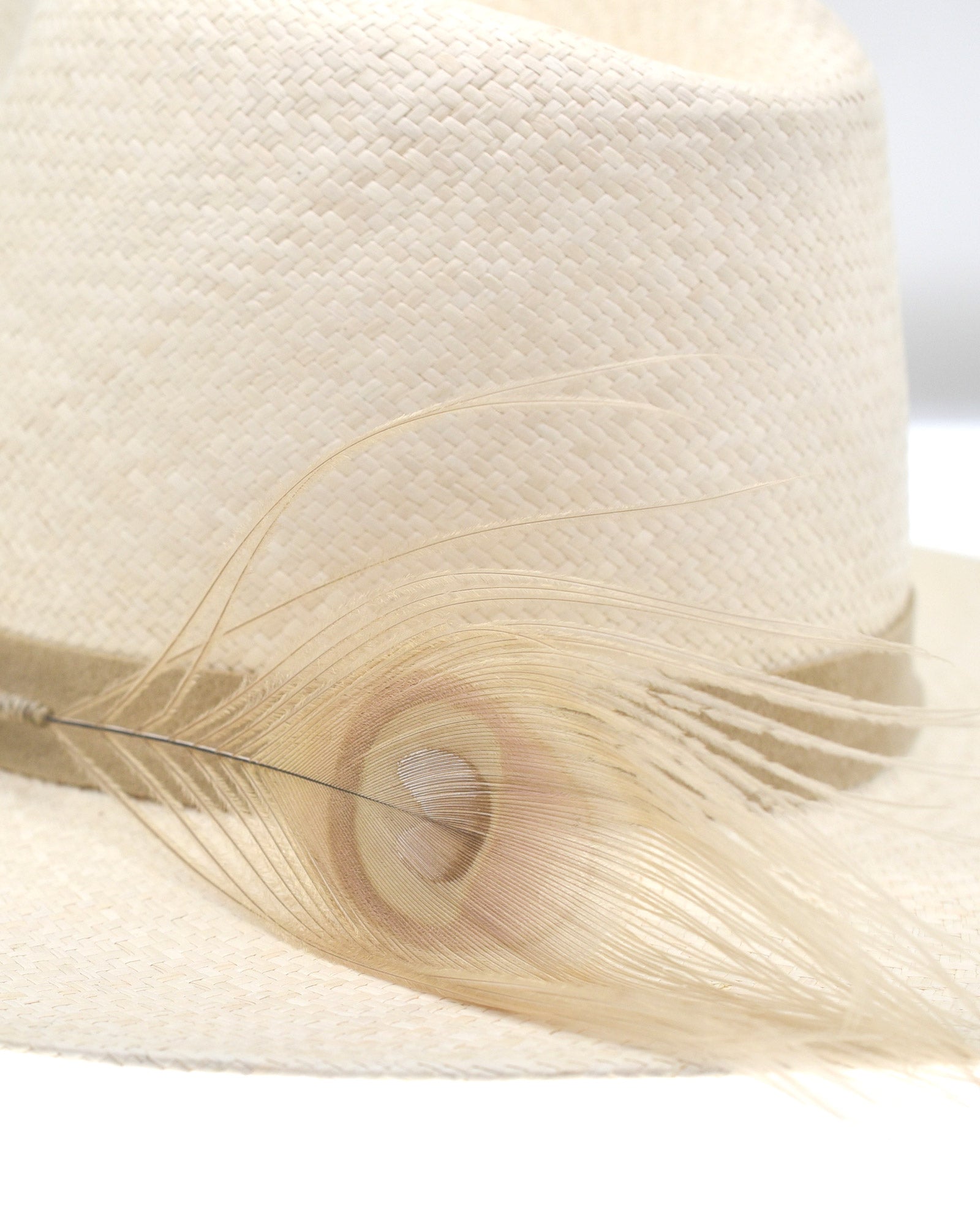 Ninakuru Panama hat with vegan band and peacock feather.