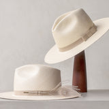Ninakuru Panama hat with vegan band and peacock feather.