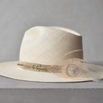 Ninakuru Panama hat with vegan band and peacock feather.