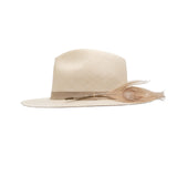 Ninakuru Panama hat with vegan band and peacock feather.