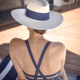 Woman wearing Ninakuru straw hat.