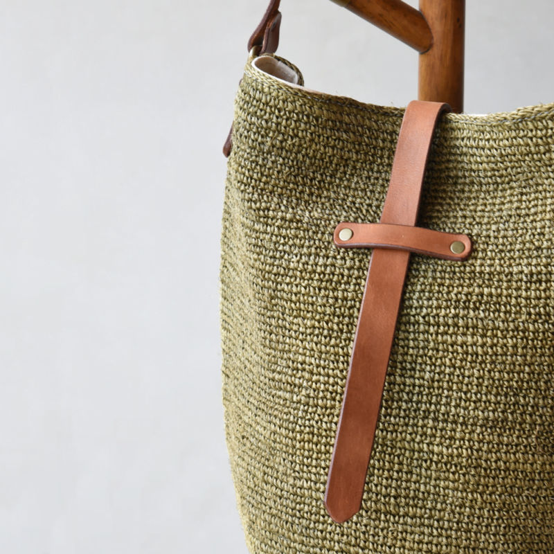Ninakuru agave crossbody bag, crochet agave straw. Leather strap tan with bronze buckle