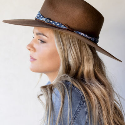 Ninakuru wool hat with cotton wrap band and leather lace.